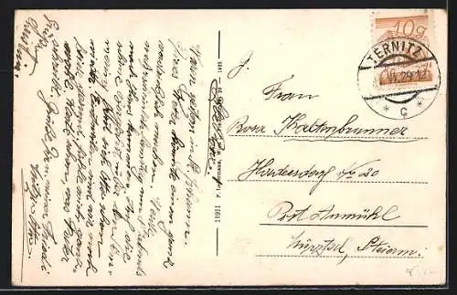 AK St. Johann am Steinfeld, Ortsansicht mit Berglandschaft