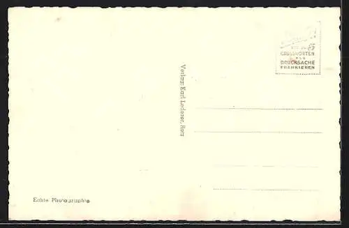 AK Retz /N. Ö., Grosshandlung mit Denkmal und Blick auf die Kirche