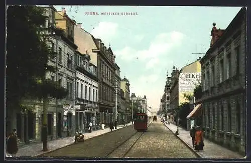 AK Riesa, Wettiner Strasse mit Strassenbahn & Geschäften