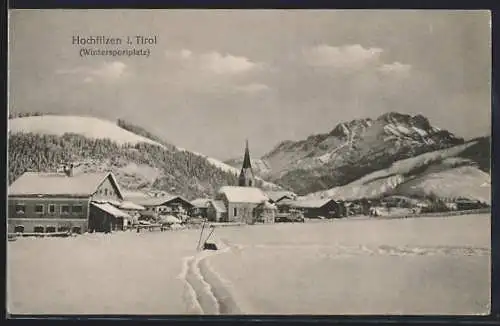 AK Hochfilzen i. Tirol, Ortsansicht mit Bergpanorama im Winter