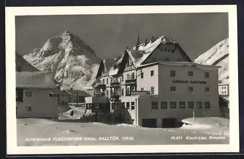 AK Galtür /Tirol, Alpenhaus Fluchthorn mit Bergspitze im Winter