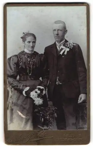 Fotografie Atelier Balde, Salzburg, Paar in festlicher Kleidung