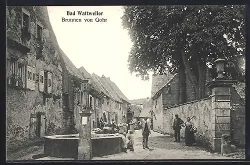 AK Bad Wattweiler, Strassenpartie mit Brunnen von Gohr