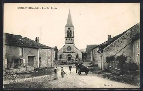 AK Saint-Thiébault, Rue de l`Église avec habitants et charrette