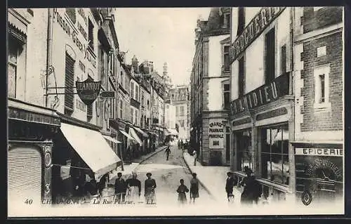 AK Chaumont, La Rue Pasteur animée avec commerces et passants