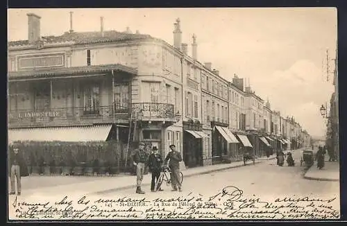 AK St-Dizier, La rue de la Sous-Préfecture avec passants et vélos