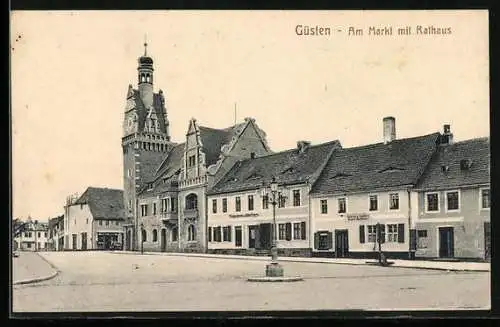 AK Güsten, Partie am Markt mit Rathaus, Bäcker- und Fleischergeschäft