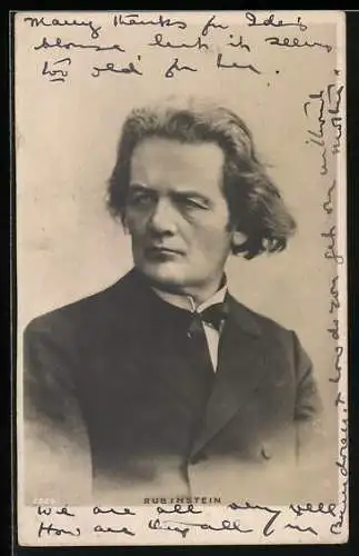 AK Rubinstein mit welligem Haar im Anzug