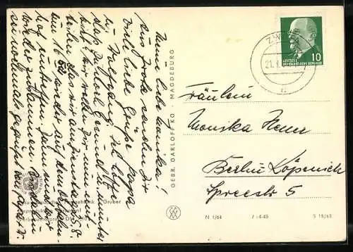 AK Sandmann streichelt einen Hasen