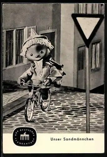 AK Sandmann fährt Fahrrad