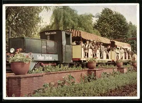 AK Essen, Gruga-Kleinbahn mit Passagieren, Ausstellung