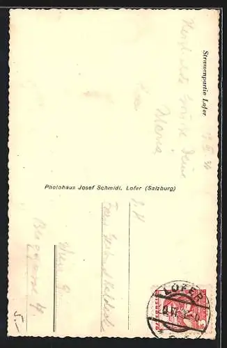 AK Lofer, Strassenpartie mit Bergen