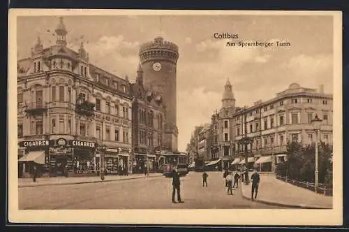 AK Cottbus, Strasse am Sprengberger Turm mit Geschäften und Strassenbahn