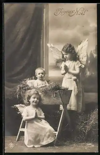 AK Weihnachtsengel beten an der Krippe des Christkindes