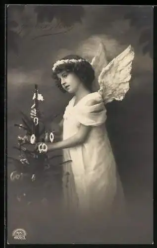 AK Weihnachtsengel mit einem geschmückten Tannenbaum, Joyeux Noel