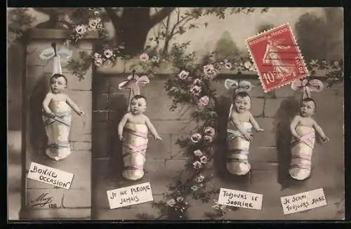 AK Babys hängen an einer Wand