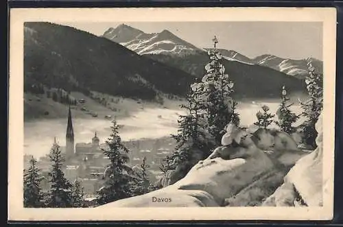 AK Davos, Blick zur Kirche im eingeschneiten Ort