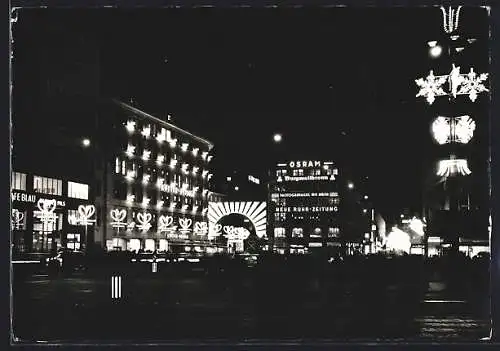 AK Essen, Am Hauptbahnhof mit Geschäftsgebäuden im Licht