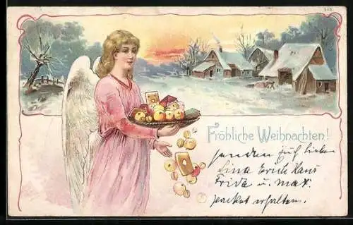 AK Weihnachtsengel mit Lebkuchen und Äpfeln vor verschneitem Dorf