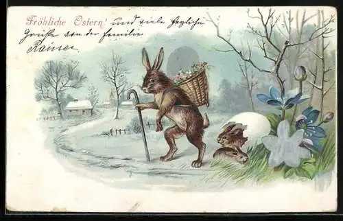 AK Osterhase trägt ein Ei im Korb durch den Schnee