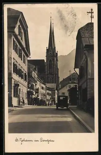 AK St. Johann im Pongau, Strassenpartie mit Kirchblick