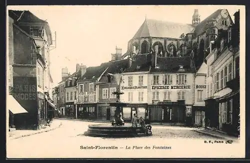 AK Saint-Florentin, La Place des Fontaines avec ses commerces et la fontaine centrale