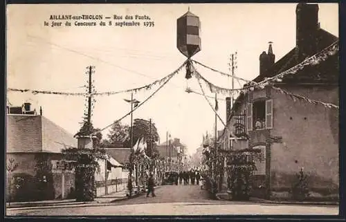 AK Aillant-sur-Tholon, Rue des Ponts, le jour du Concours du 5 septembre 1935
