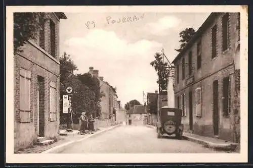 AK Pourrain /Yonne, Rue principale avec voiture et bâtiments en briques