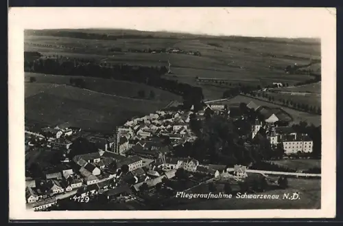 AK Schwarzenau /N.-D., Teilansicht mit Kirche, Fliegeraufnahme