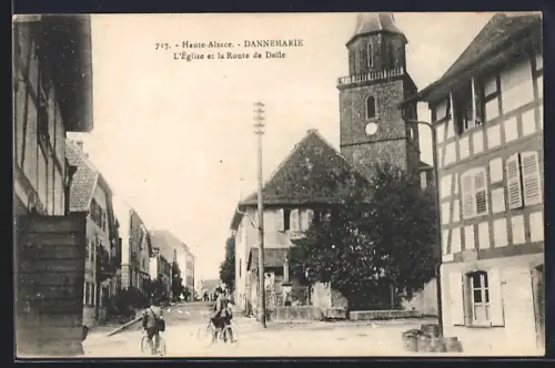 AK Dannemarie /Haute-Alsace, L`Église et la Route de Delle