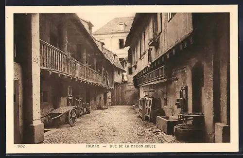 AK Colmar, Rue de la Maison Rouge avec charrette et architecture traditionnelle