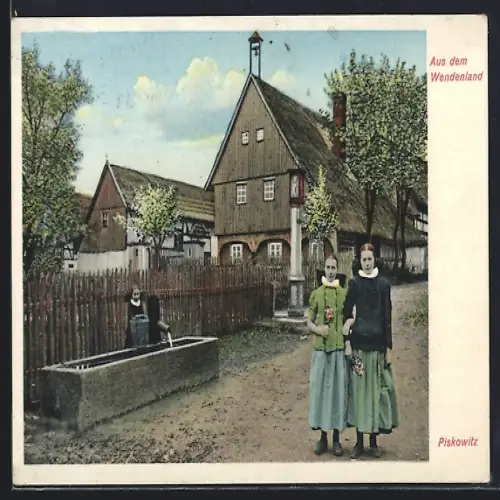 AK Piskowitz / Kamenz, Dorfstrasse mit Bauernhaus und Frauen in Tracht aus dem Wendenland