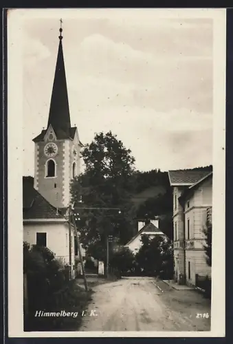 AK Himmelberg i. K., Strassenpartie mit Kirche