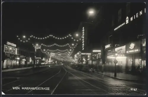 AK Wien, Mariahilferstrasse mit Geschäften bei Nacht