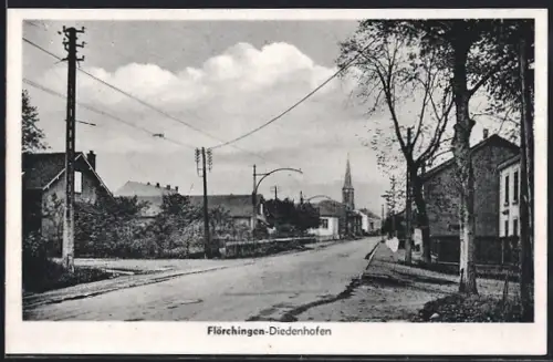 AK Flörchingen /Diedenhofen, Vue de la rue principale avec église au fond