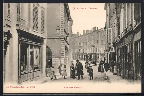 AK Mirecourt /Vosges, Rue des Halles animée avec passants et facades de boutiques