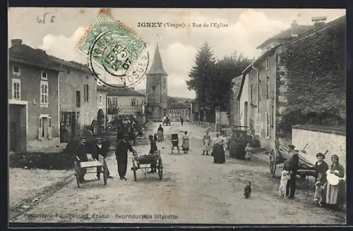 AK Igney /Vosges, Rue de l`Église avec habitants et chariots