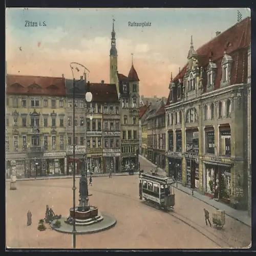 AK Zittau i. S., Rathausplatz mit Geschäften und Strassenbahn