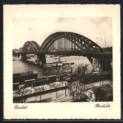 AK Düsseldorf, Rheinbrücke mit Dampfer