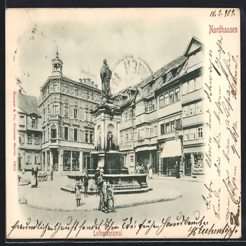 AK Nordhausen, Strassenpartie mit Geschäften und Lutherdenkmal