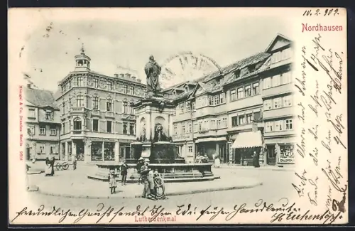 AK Nordhausen, Strassenpartie mit Geschäften und Lutherdenkmal