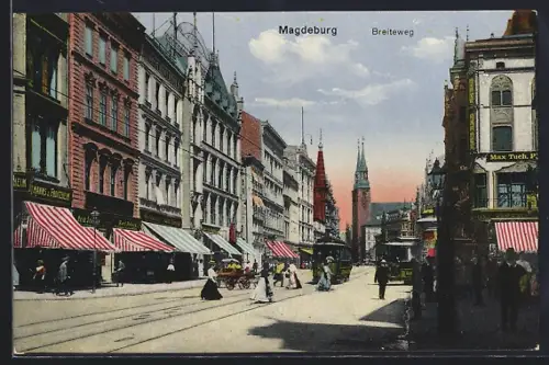 AK Magdeburg, Strasse Breiteweg mit Geschäften, Kirche und Strassenbahn