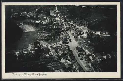 AK Beckingen /Saar, Strassenpartie mit Kirche, Fliegeraufnahme