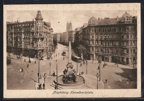 AK Magdeburg, Hasselbachplatz mit Geschäften, Brunnen und Strassenbahn