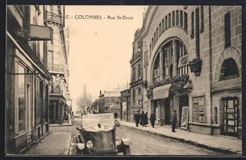 AK Colombes, Rue St-Denis avec automobile ancienne et passants