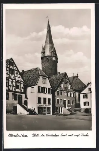 AK Ottweiler /Saar, Platz der Freistuhlen Turm mit evgl. Kirche, Metzgerei Presser