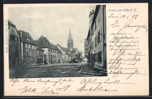 AK Sulz /O. E., Strassenpartie mit Kirche