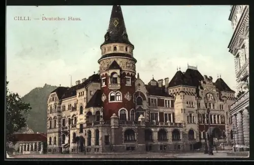 AK Cilli, Deutsches Haus mit Nachbargebäuden und Bergblick