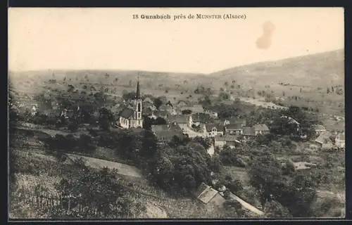 AK Gunsbach, Vue du village et de l`église dans le paysage alsacien