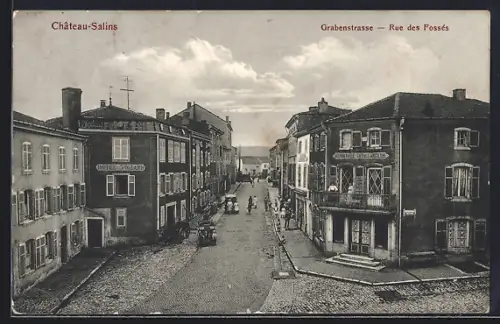 AK Château-Salins, Rue des Fossés avec hôtels et bâtiments historiques